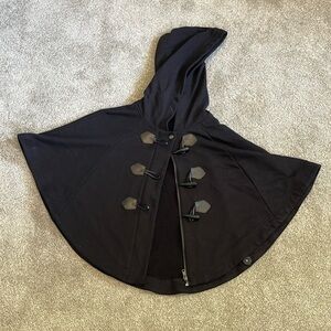 Forever 21 cape-let. One size. Has zipper and toggle closures